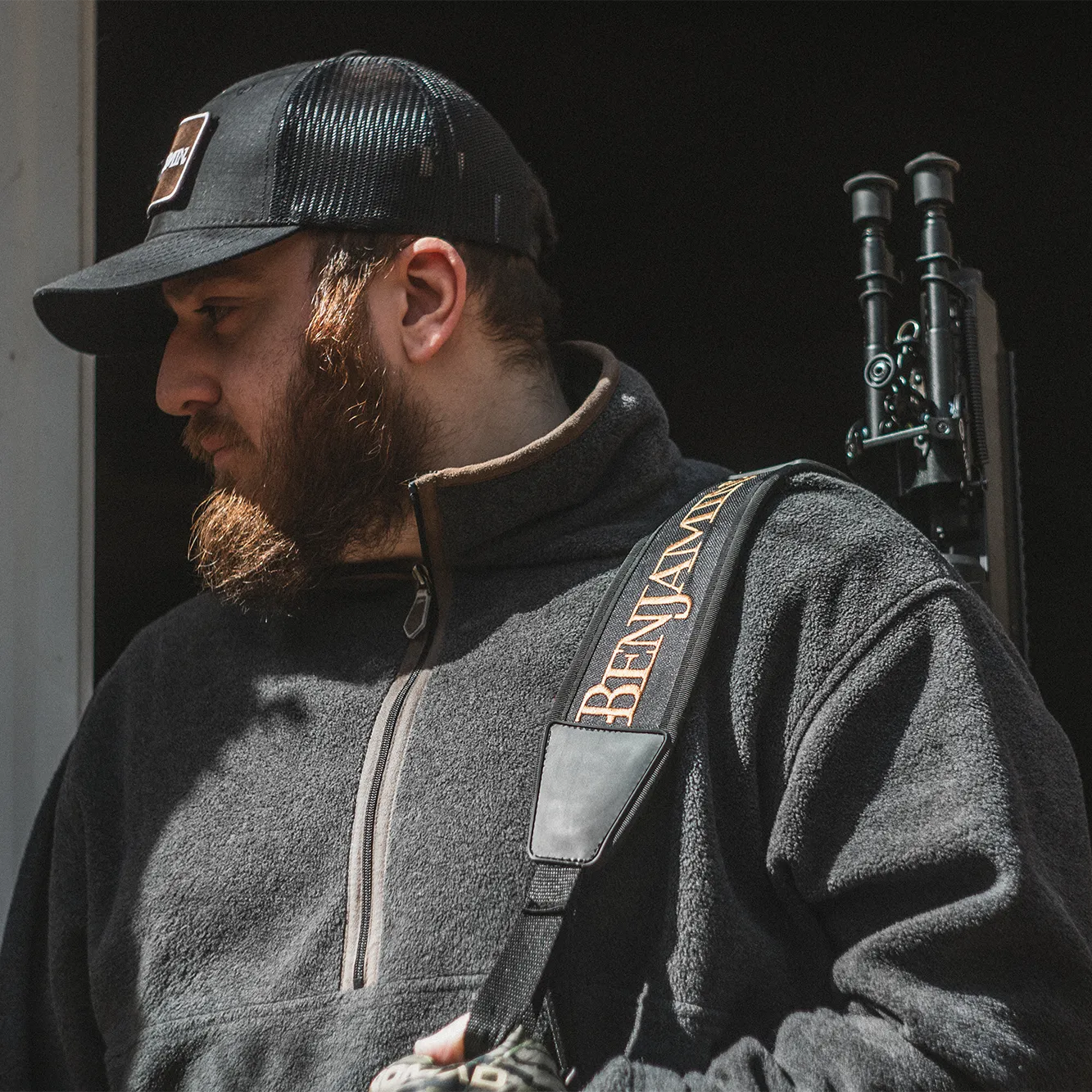 Benjamin Sling BPAGS Outdoor Lifestyle Man in Sunlight with Thumb through Loop