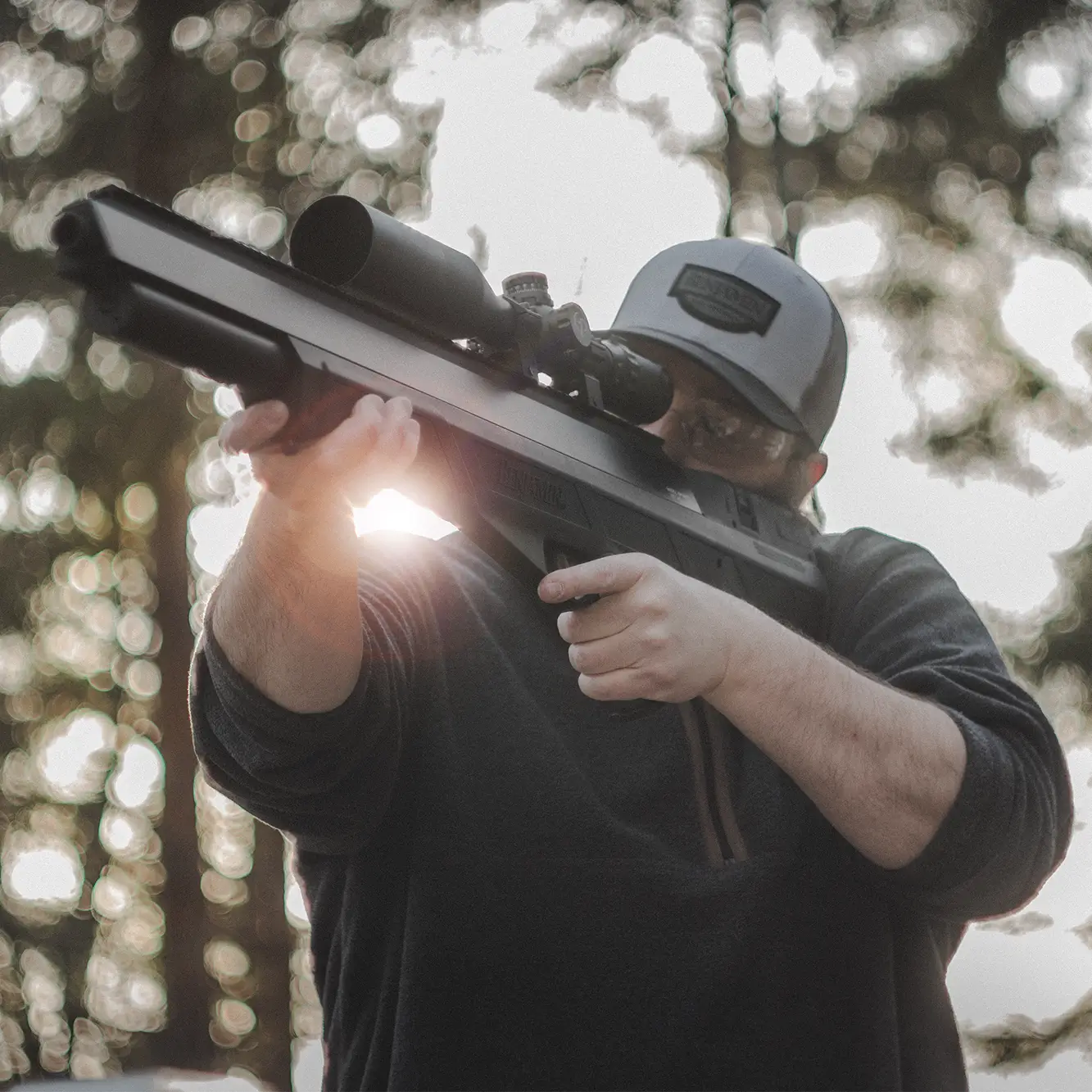 Benjamin Bulldog M357 BPBM3S BPBM3KA Outdoor Lifestyle Man Aiming Rifle off Deck