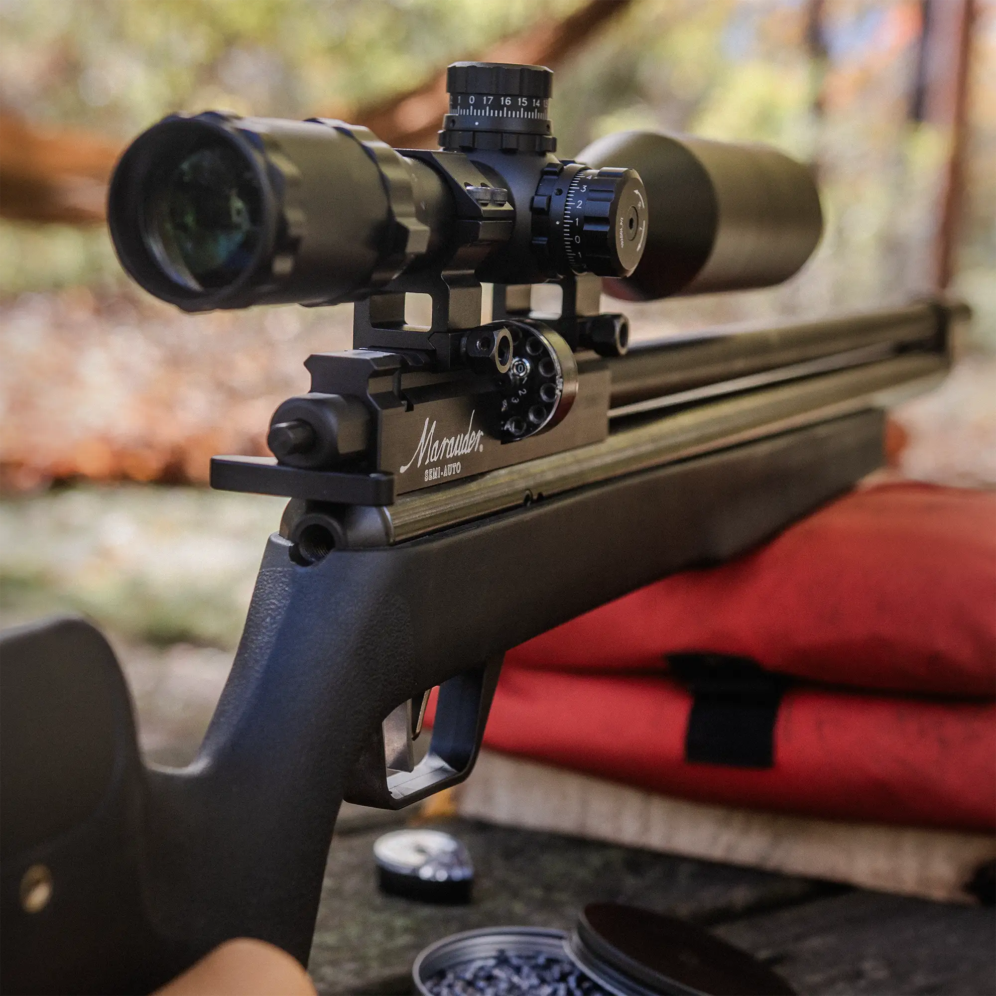 Benjamin Marauder Semi-Automatic BP22SAS Lifestyle Outdoors Sitting on a Bench Rest on Sunny Day